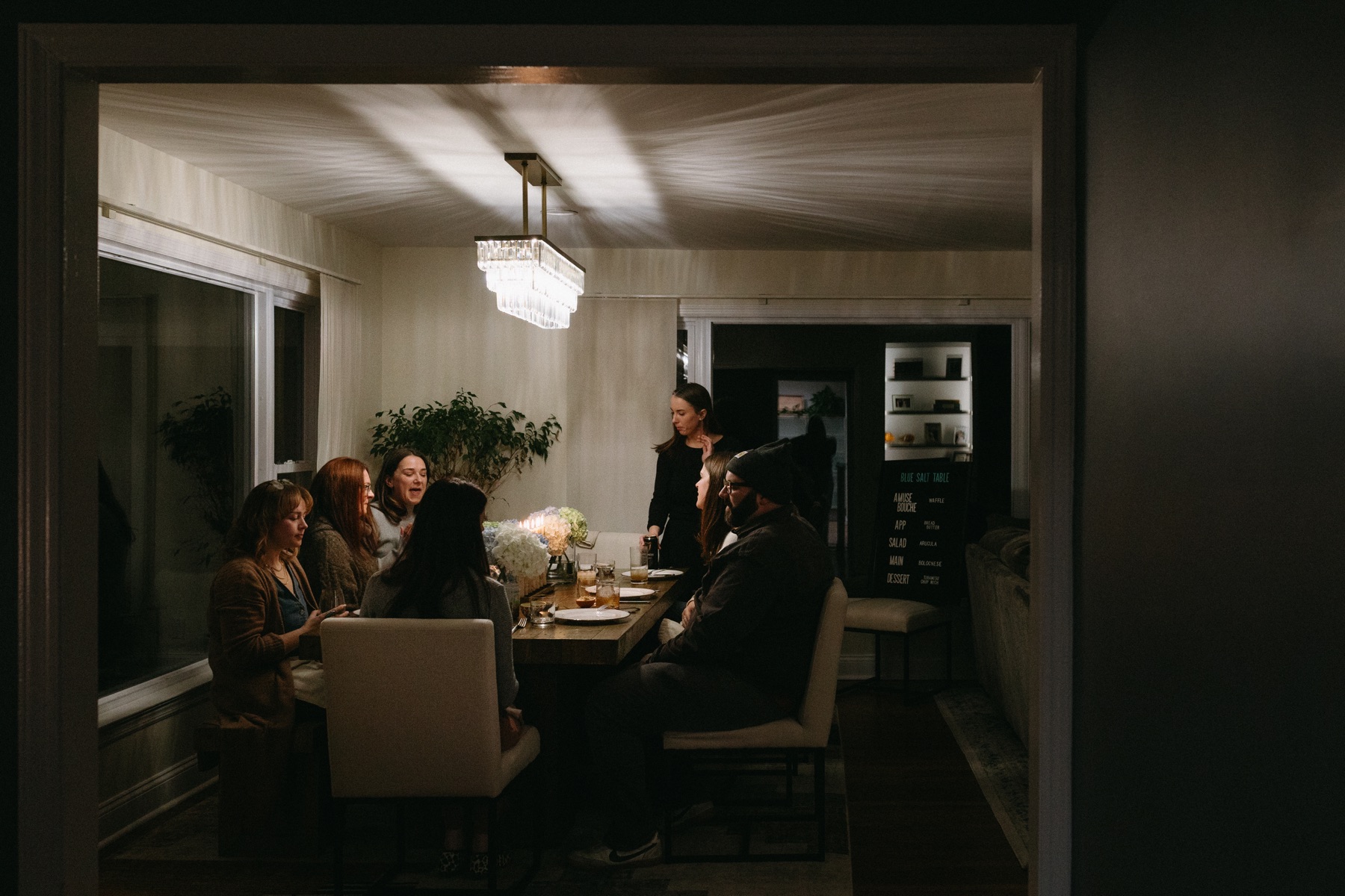 Guests gathered around the dinner table